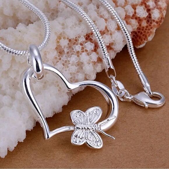 The Butterfly Heart Pendant in 925 silver on 18” snake chain. - Picture 1 of 6